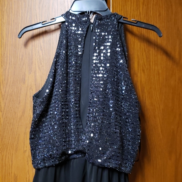 Black jumpsuit. - Picture 2 of 4